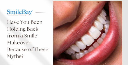 Close-up of a person smiling with straight, white teeth after a smile makeover at SmileBay Dental.