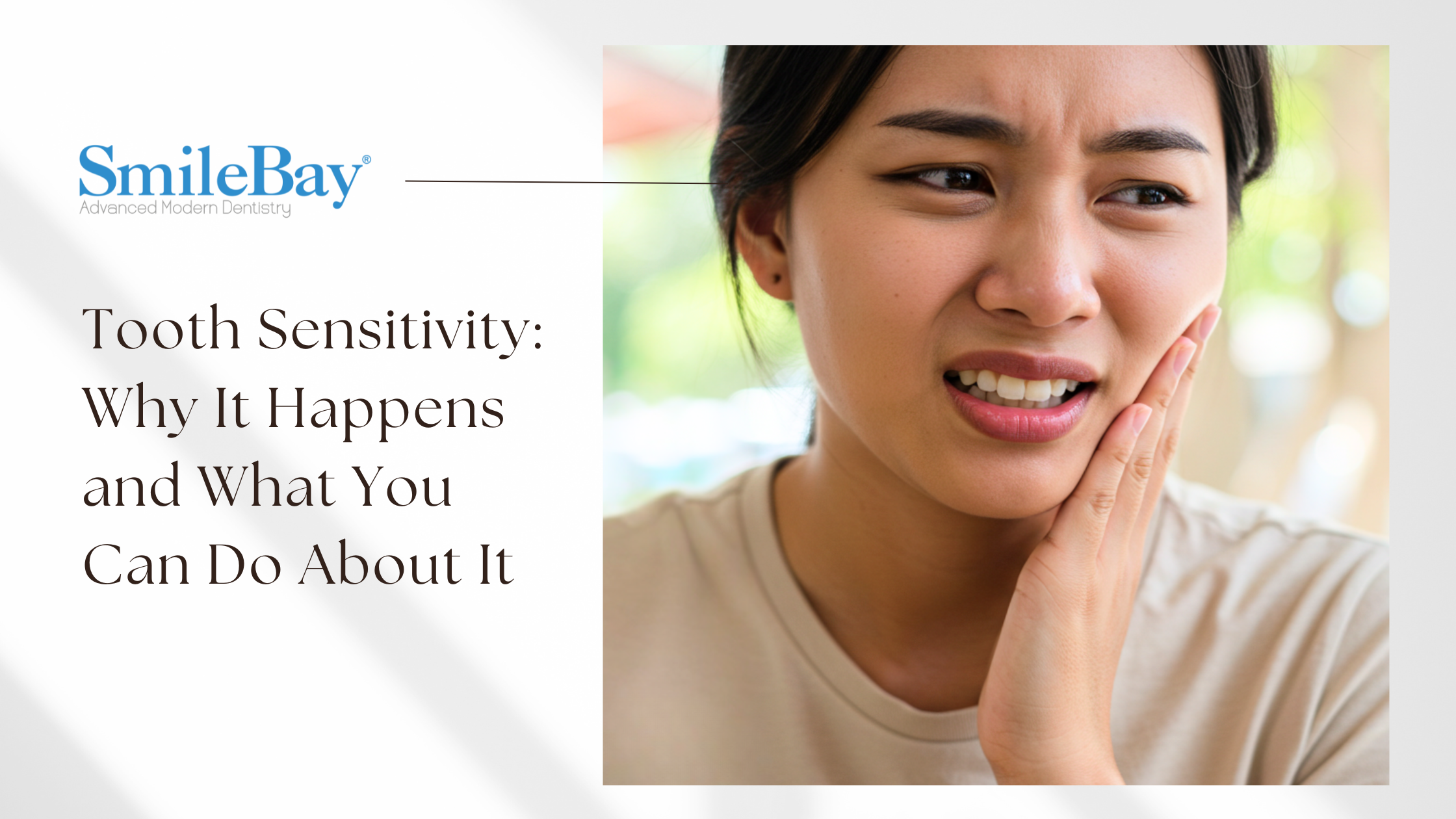 Woman touching her cheek in discomfort due to tooth sensitivity