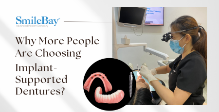 SmileBay dentist performing implant-supported dentures procedure in Penang