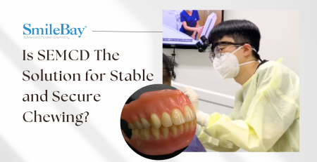 SmileBay dentist performing SEMCD procedure for stable dentures in Penang